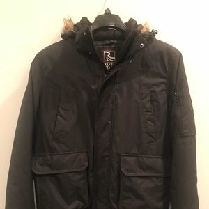 Black zipped up coat with fur hoodie